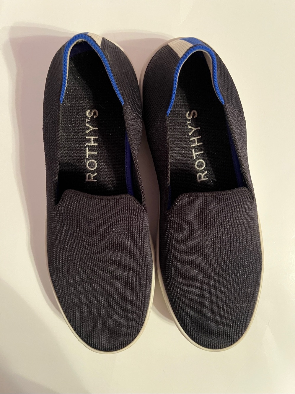 Rothy's Women’s Black Slip-On Sneakers Size 8 with Blue & White Stripe Accent